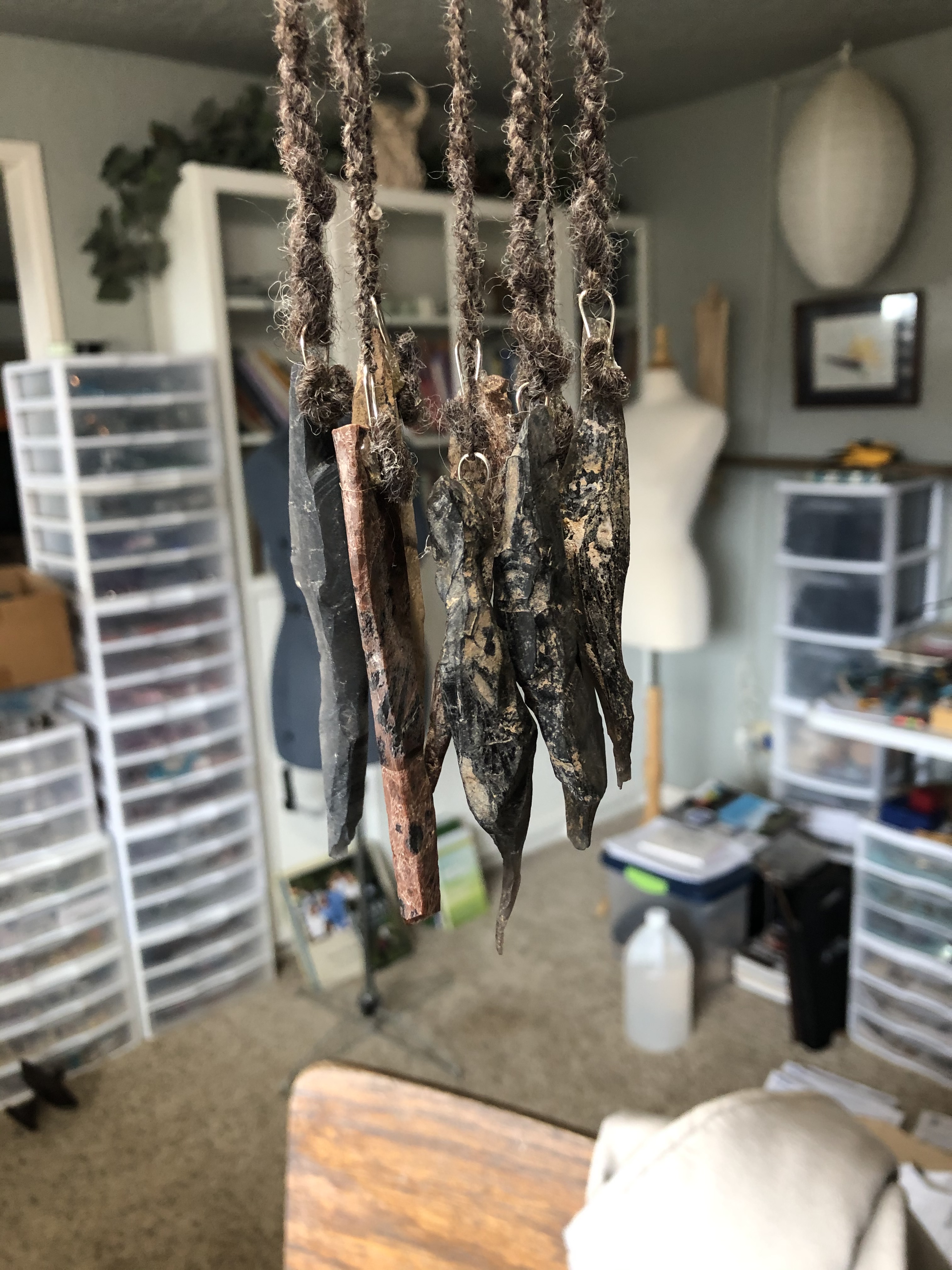 Wind Chimes: found wood, hand spun yarn, and obsidian shards. I love the sound!!!